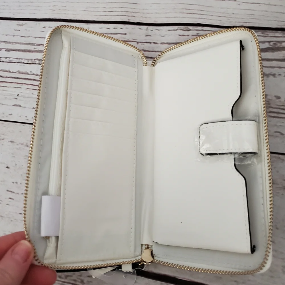 No Boundaries women's vinyl zip around wallet wristlet white